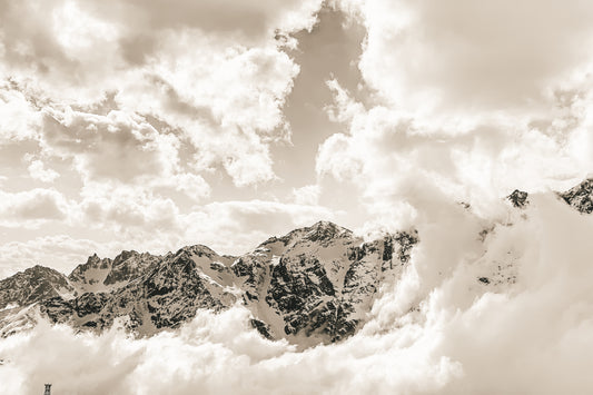 The iconic Matterhorn peak surrounded by clouds in Breuil-Cervinia, Italy