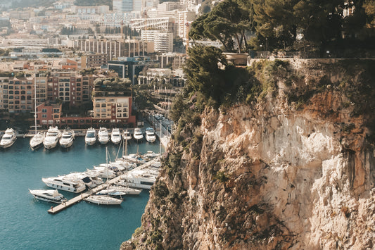 Scenic Shot of Monaco Port Featuring Yachts and a Stunning Cliff